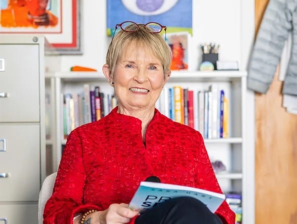 Senior woman holding a magazine